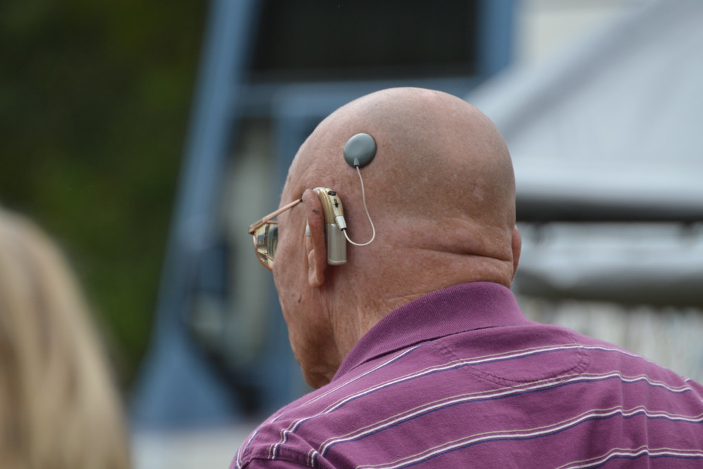 man with hearing aids